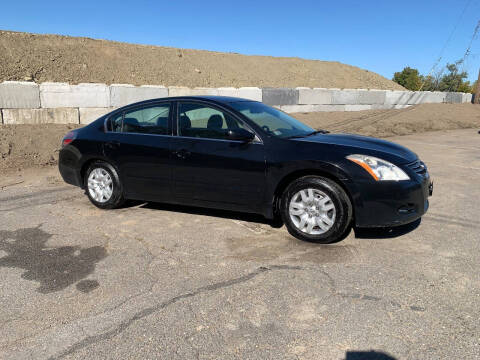 2011 Nissan Altima for sale at Desi's Used Cars in Peabody MA