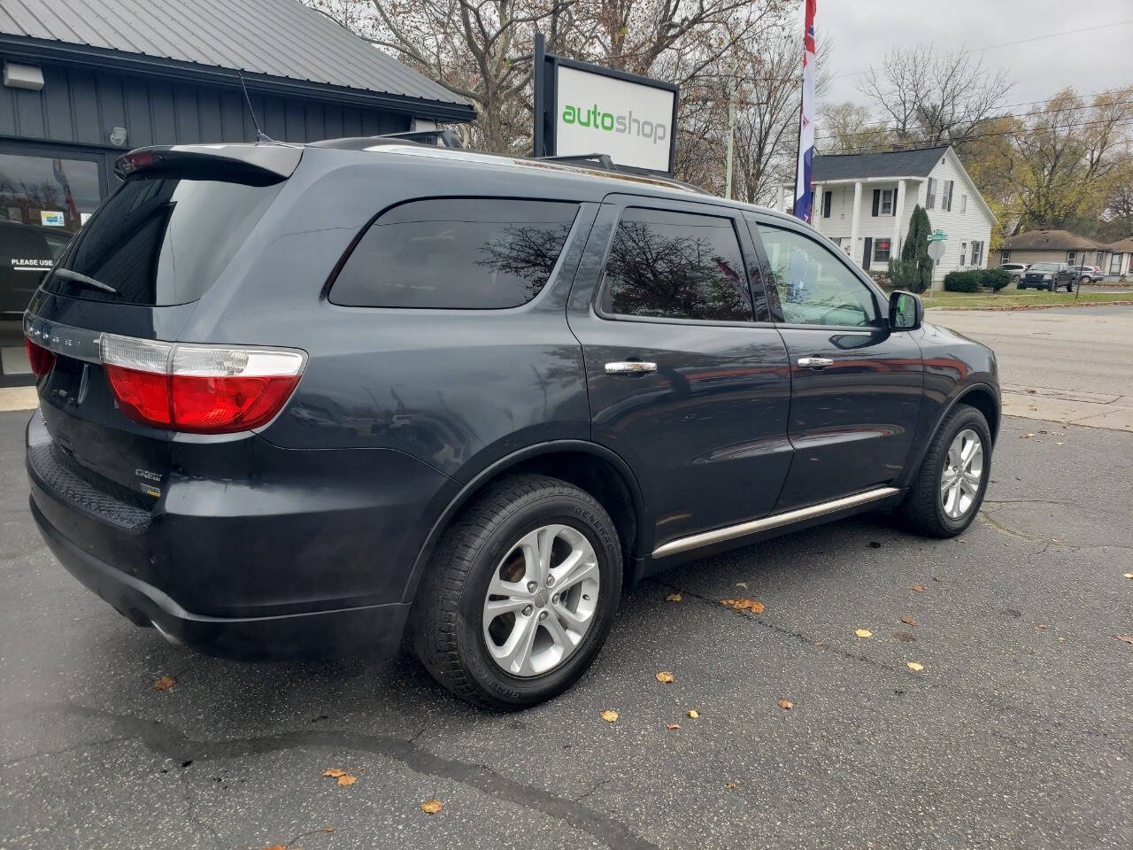 2013 Dodge Durango for sale at Auto Shop in Wyoming, MI