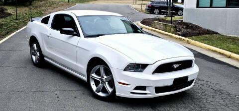 2014 Ford Mustang for sale at BOOST MOTORS LLC in Sterling VA