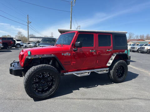2014 Jeep Wrangler Unlimited for sale at CarTime in Rogers AR