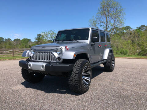 2014 Jeep Wrangler Unlimited for sale at West Mobile Auto Outlet in Mobile AL