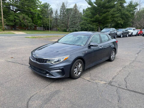 2019 Kia Optima for sale at Northstar Auto Sales LLC in Ham Lake MN