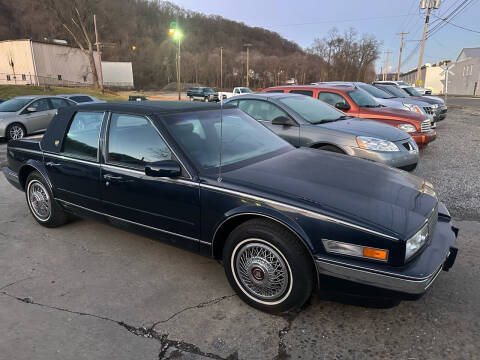 1987 Cadillac Seville for sale at SAVORS AUTO CONNECTION LLC in East Liverpool OH