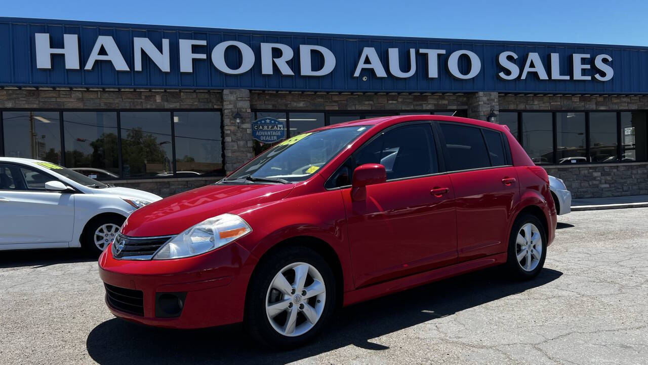 Red 2012 Nissan Versa Hatchback Front-Wheel Drive Continuously Variable Transmission