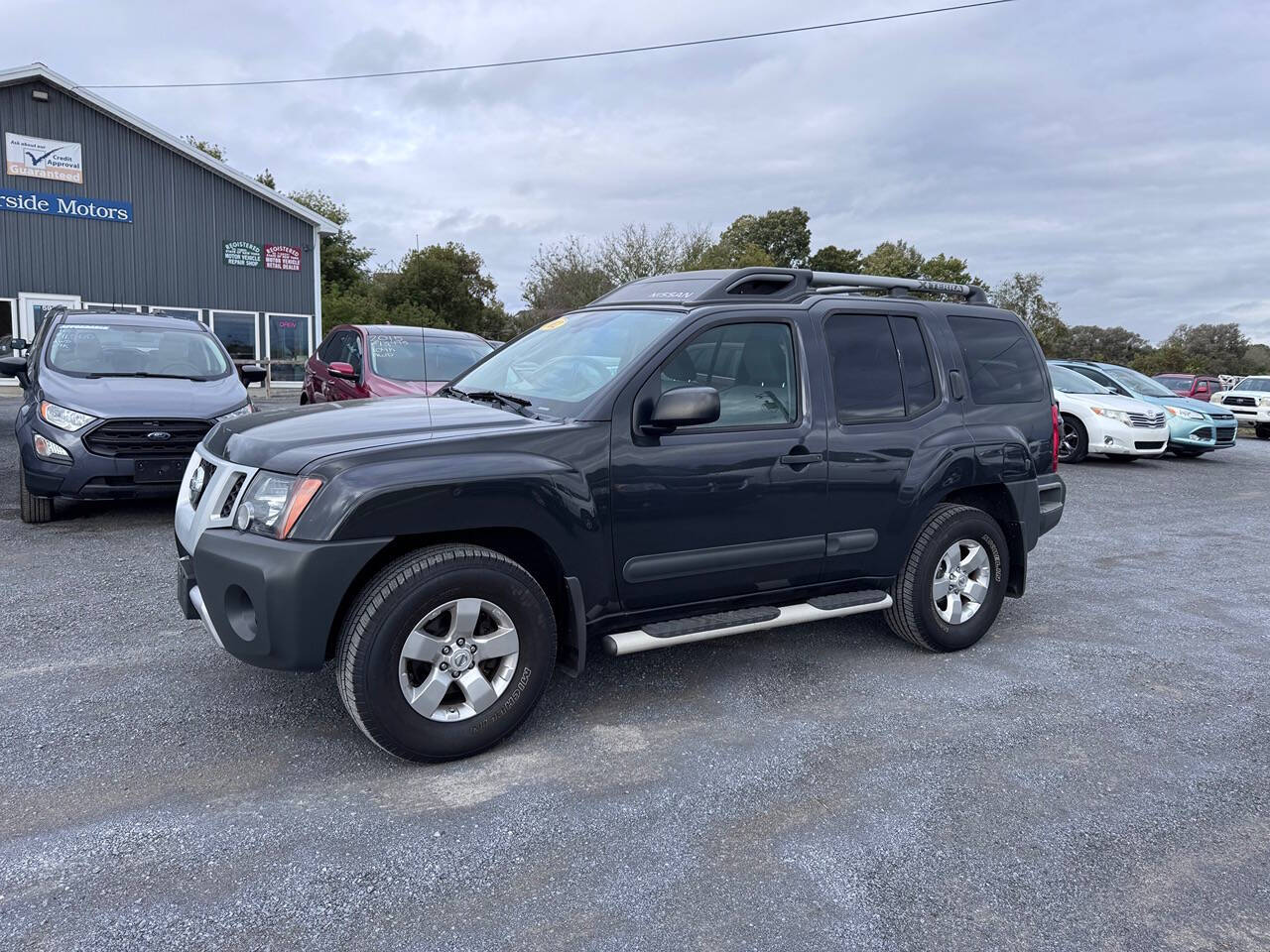 2012 Nissan Xterra for sale at Riverside Motors in Glenfield, NY