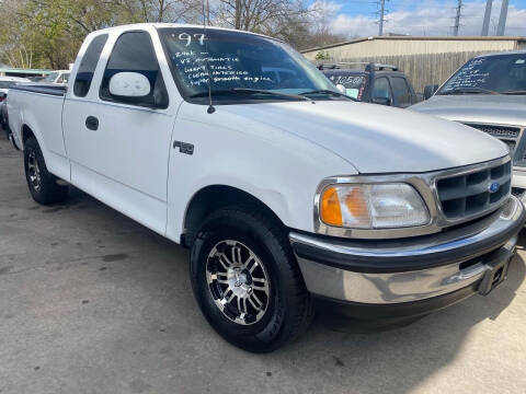 1997 Ford F-150 for sale at Buy-Fast Autos in Houston TX