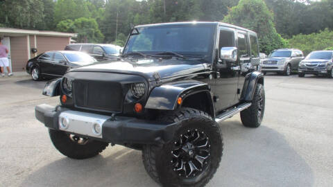 2011 Jeep Wrangler Unlimited for sale at Atlanta Luxury Motors Inc. in Buford GA