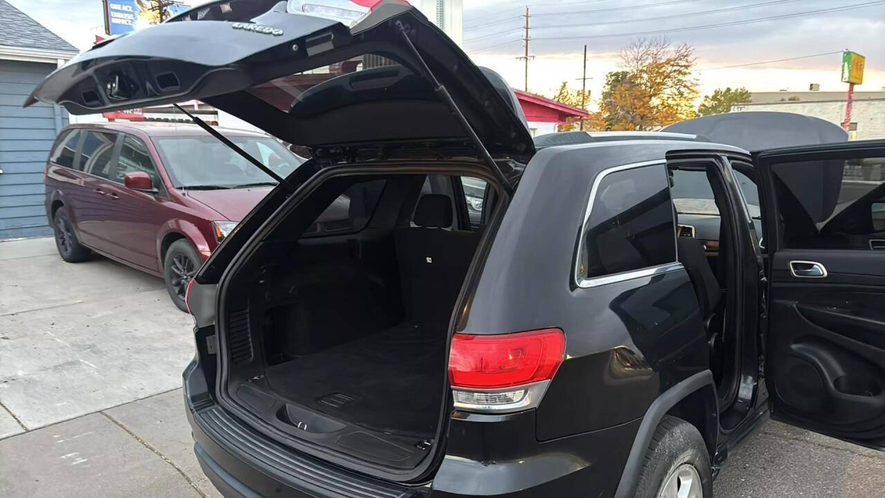 2014 Jeep Grand Cherokee for sale at Ganda Auto Sales in Denver, CO