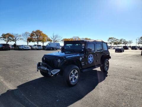 2011 Jeep Wrangler Unlimited for sale at BH Auto Group in Brooklyn NY