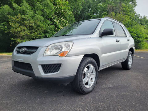 2009 Kia Sportage for sale at Spectra Autos LLC in Akron OH