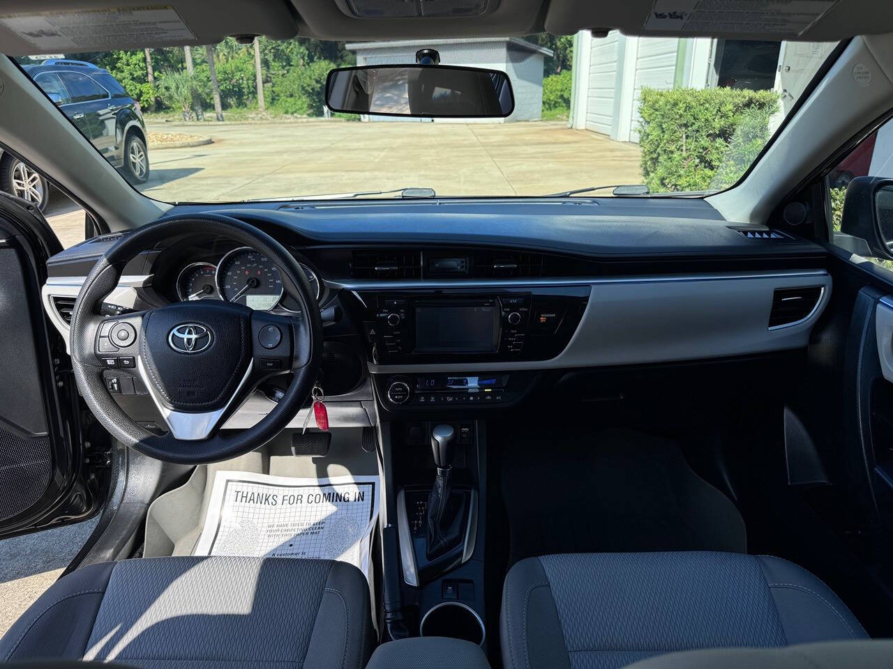 2016 Toyota Corolla for sale at Deans Auto Outlet in Ormond Beach, FL