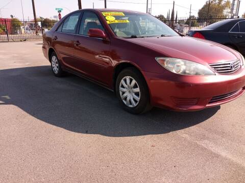 2005 Toyota Camry for sale at COMMUNITY AUTO in Fresno CA
