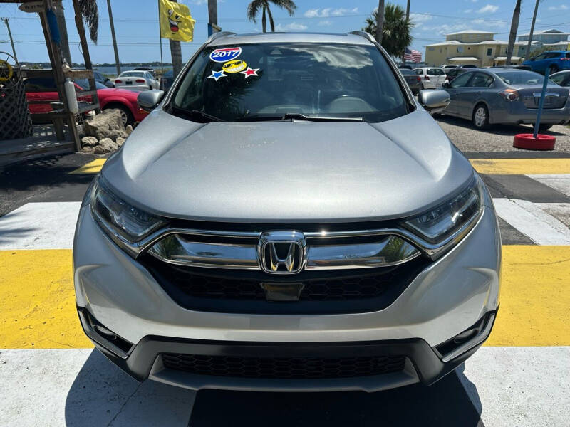 Used 2017 Honda CR-V Touring with VIN 5J6RW1H99HL008259 for sale in Melbourne, FL