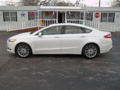 2014 Ford Fusion for sale at R V Used Cars LLC in Georgetown OH