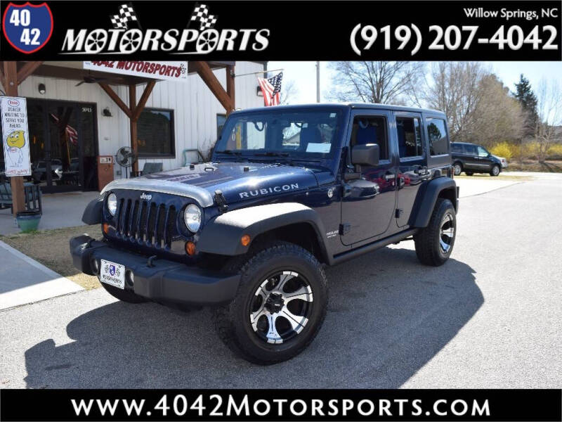 2013 Jeep Wrangler Unlimited for sale at 4042 Motorsports in Willow Spring NC