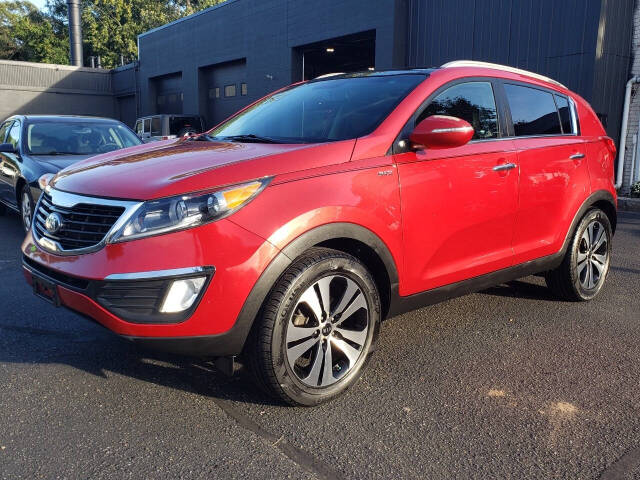 2013 Kia Sportage for sale at Auto Shop in Wyoming, MI