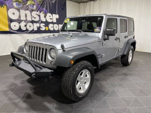 2016 Jeep Wrangler Unlimited for sale at Monster Motors in Michigan Center MI
