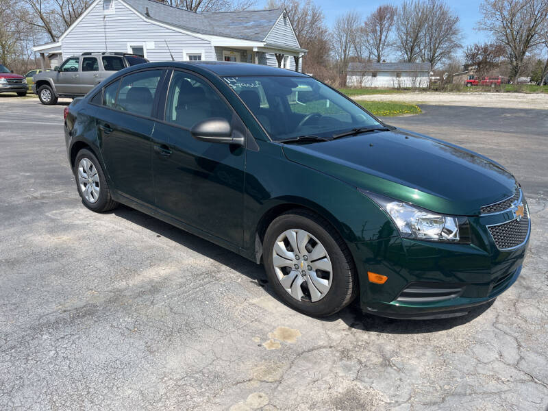 2014 Chevrolet Cruze for sale at HEDGES USED CARS in Carleton MI