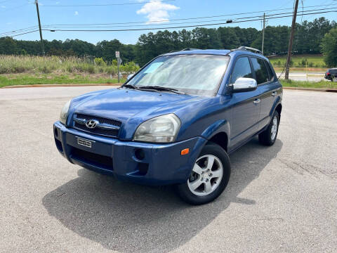 2005 Hyundai Tucson for sale at El Camino Auto Sales - FALCONS AUTOMOTIVE LLC in Flowery Branch GA