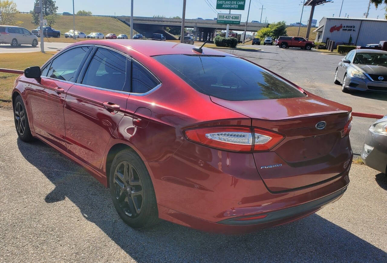 2015 Ford Fusion for sale at DURANGO AUTO CENTER LLC in Tulsa, OK