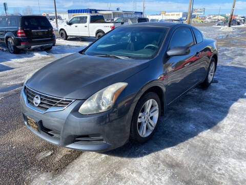 2010 Nissan Altima for sale at BELOW BOOK AUTO SALES in Idaho Falls ID