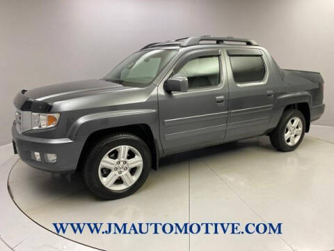 2013 Honda Ridgeline for sale at J & M Automotive in Naugatuck CT