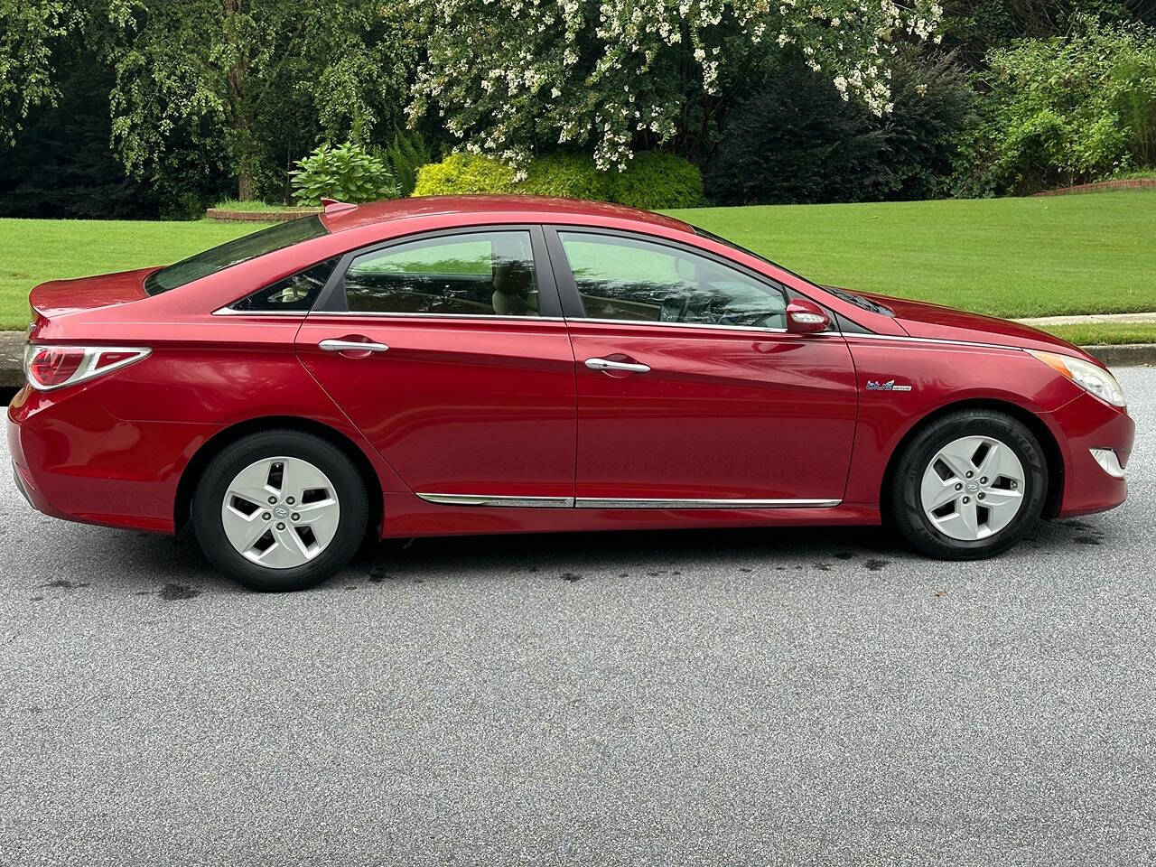 2012 Hyundai SONATA Hybrid for sale at SHURE AUTO SALES in Snellville, GA