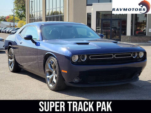 2015 Dodge Challenger for sale at RAVMOTORS - CRYSTAL in Crystal MN