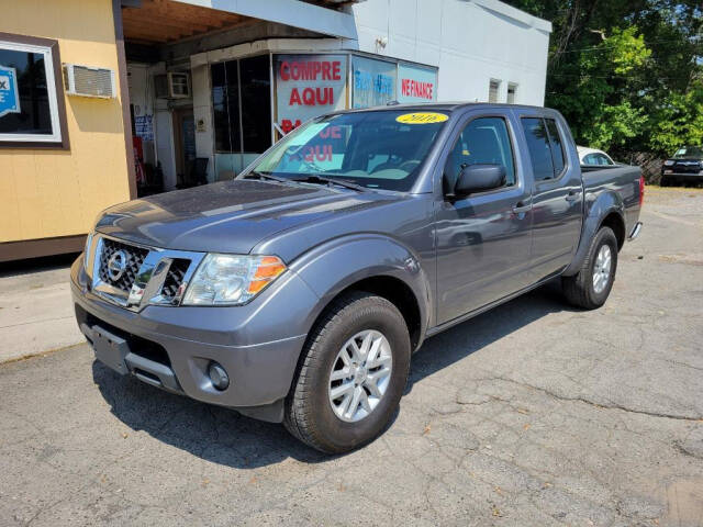 2016 Nissan Frontier for sale at DAGO'S AUTO SALES LLC in Dalton, GA