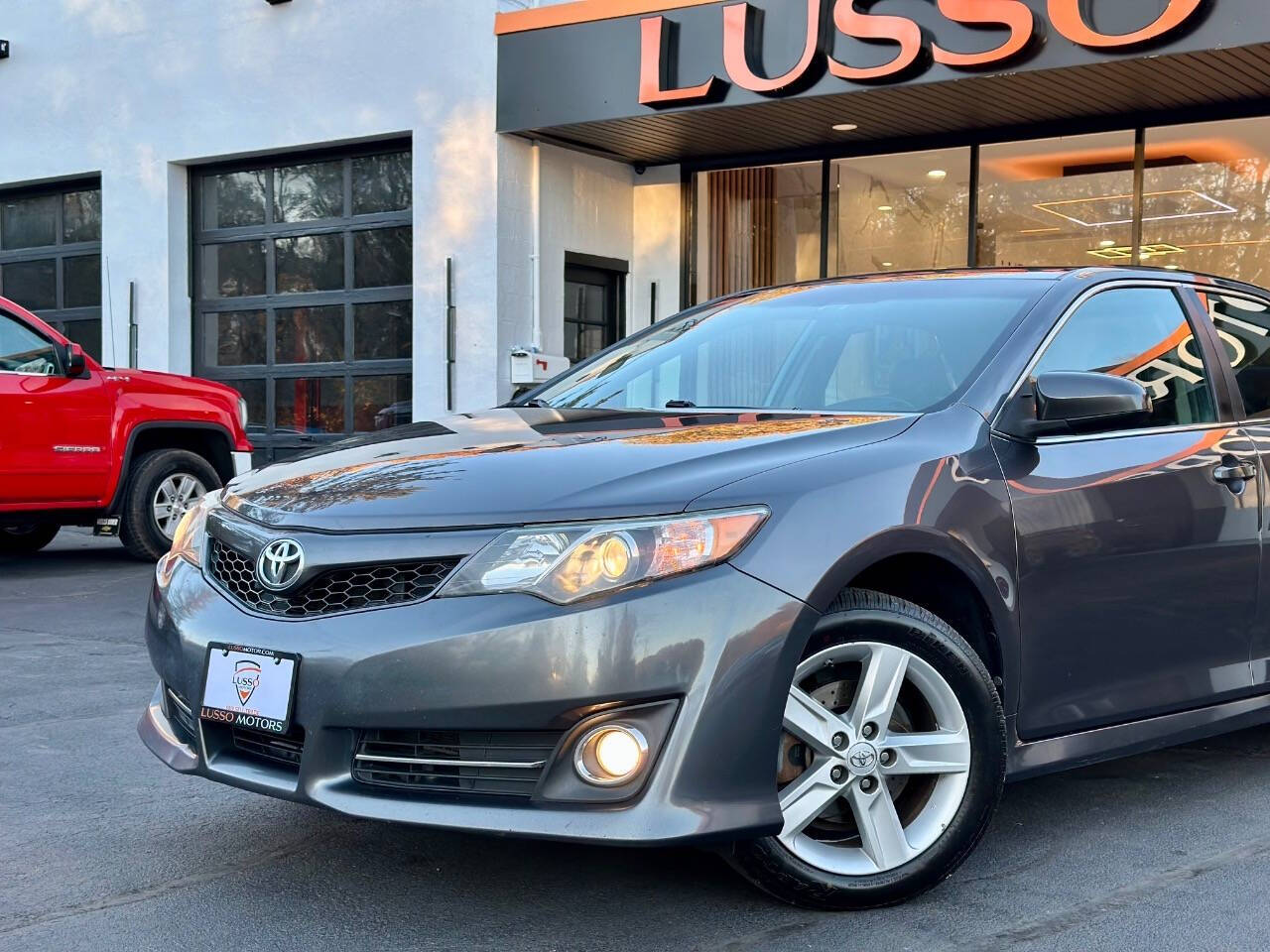 2014 Toyota Camry for sale at Lusso Motors in Amsterdam, NY