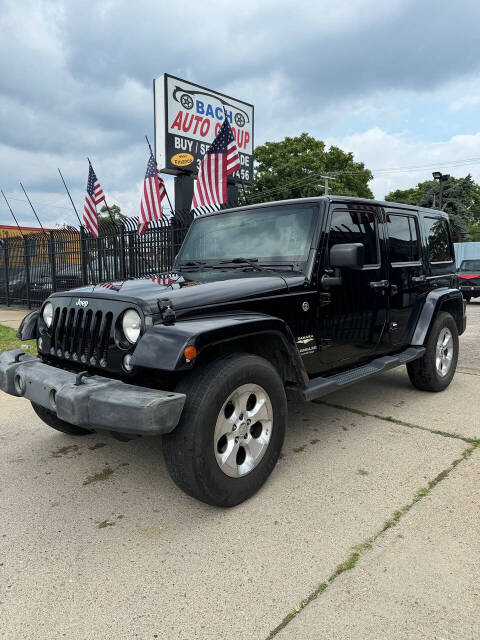 2014 Jeep Wrangler Unlimited for sale at BACH AUTO GROUP in Detroit, MI