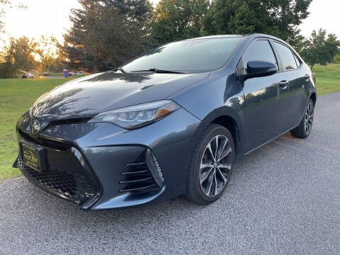 2017 Toyota Corolla for sale at BELOW BOOK AUTO SALES in Idaho Falls ID