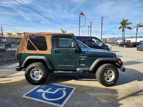2000 Jeep Wrangler for sale at E and M Auto Sales in Bloomington CA