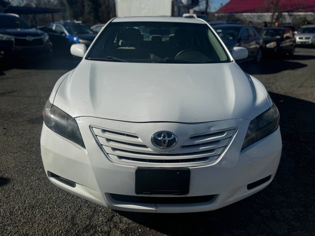 2009 Toyota Camry for sale at Walkem Autos in District Heights, MD