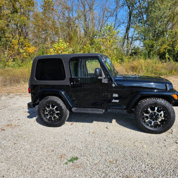 2004 Jeep Wrangler for sale at Grace Motors in Evansville IN