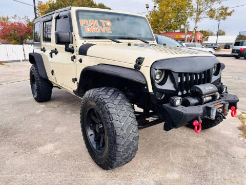 2011 Jeep Wrangler Unlimited for sale at CE Auto Sales in Baytown TX