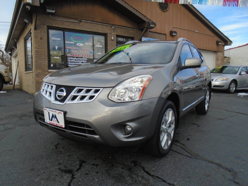 2011 Nissan Rogue for sale at IBARRA MOTORS INC in Berwyn IL