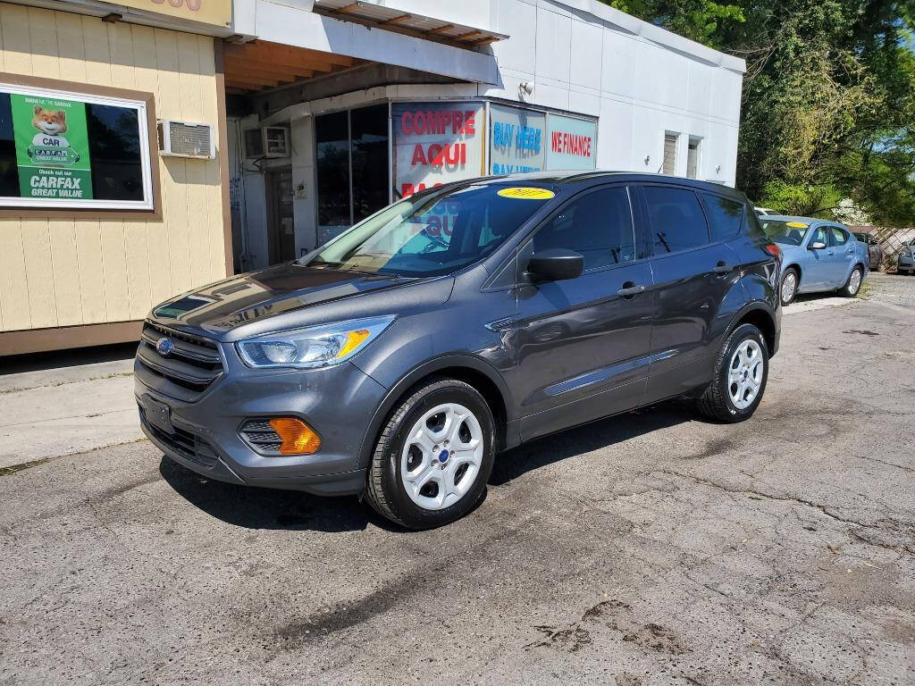 2017 Ford Escape for sale at DAGO'S AUTO SALES LLC in Dalton, GA