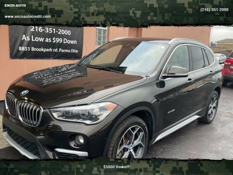 2018 BMW X1 for sale at ENZO AUTO in Parma OH