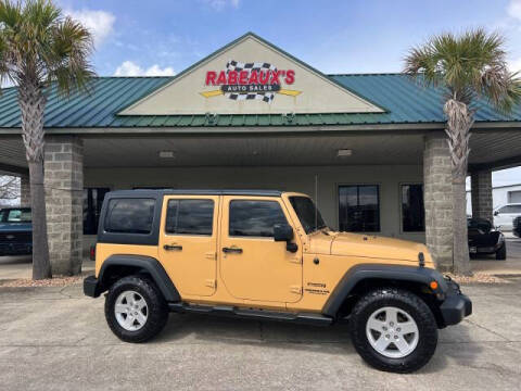 2014 Jeep Wrangler Unlimited for sale at Rabeaux's Auto Sales in Lafayette LA