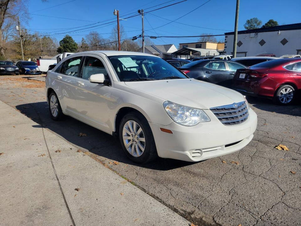 2010 Chrysler Sebring for sale at DAGO'S AUTO SALES LLC in Dalton, GA