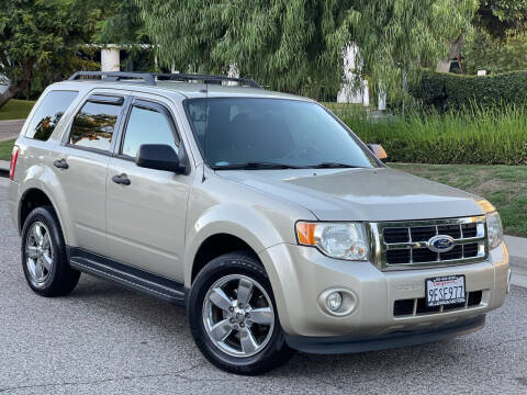 2012 Ford Escape for sale at MILLENNIUM MOTORS in Van Nuys CA