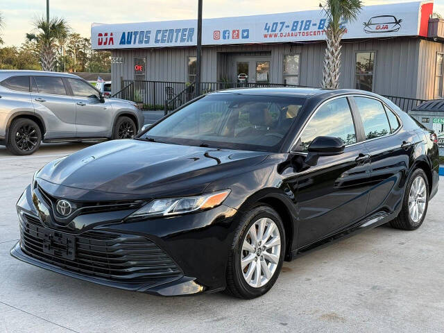 2018 Toyota Camry for sale at DJA Autos Center in Orlando, FL