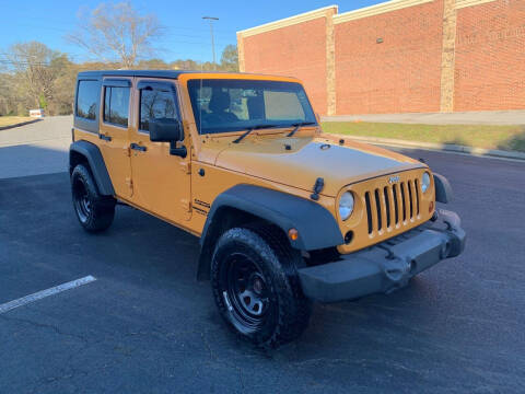 2013 Jeep Wrangler Unlimited for sale at First Auto Sales in Winder GA