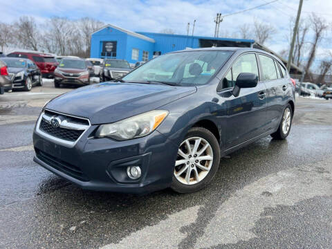 2012 Subaru Impreza for sale at MGM Auto Group in Framingham MA
