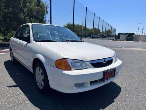 1999 Mazda Protege for sale at R&A Auto Sales, inc. in Sacramento CA
