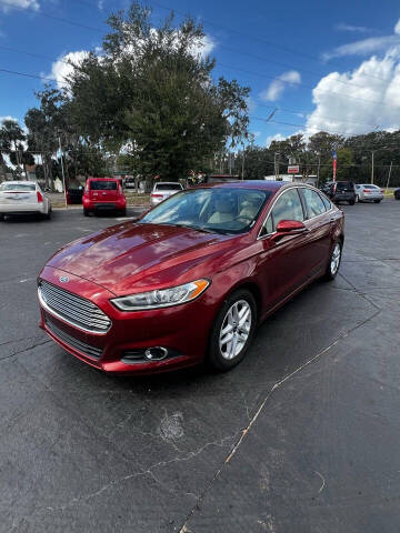 2014 Ford Fusion for sale at BSS AUTO SALES INC in Eustis FL