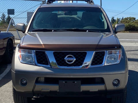 2006 Nissan Pathfinder for sale at PRICELESS AUTO SALES LLC in Auburn WA