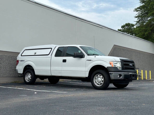 2013 Ford F-150 for sale at Prompt Luxury Cars LLC in Austell, GA