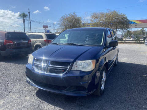 2014 Dodge Grand Caravan for sale at Lamar Auto Sales in North Charleston SC